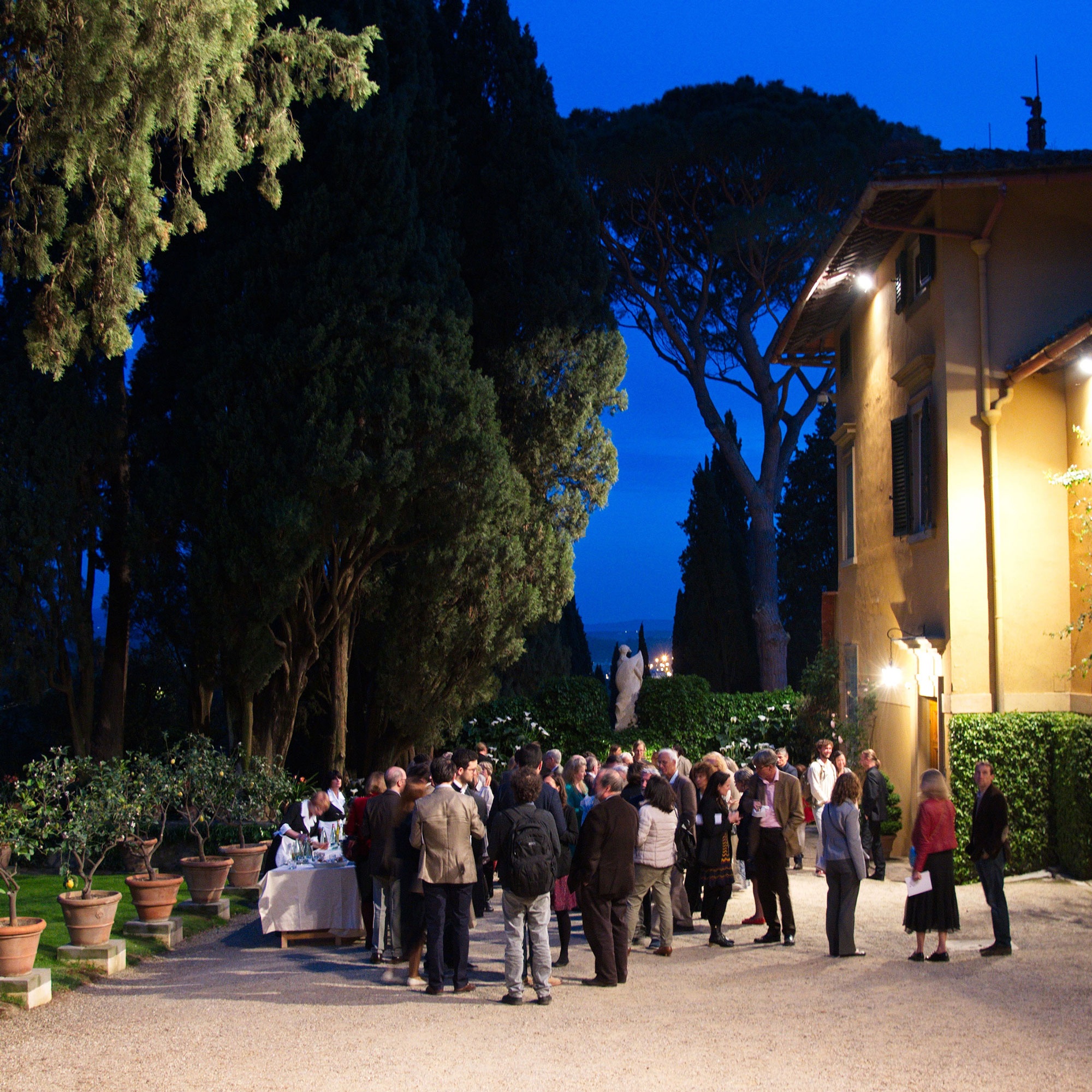 Guests on the south terrace at I Tatti