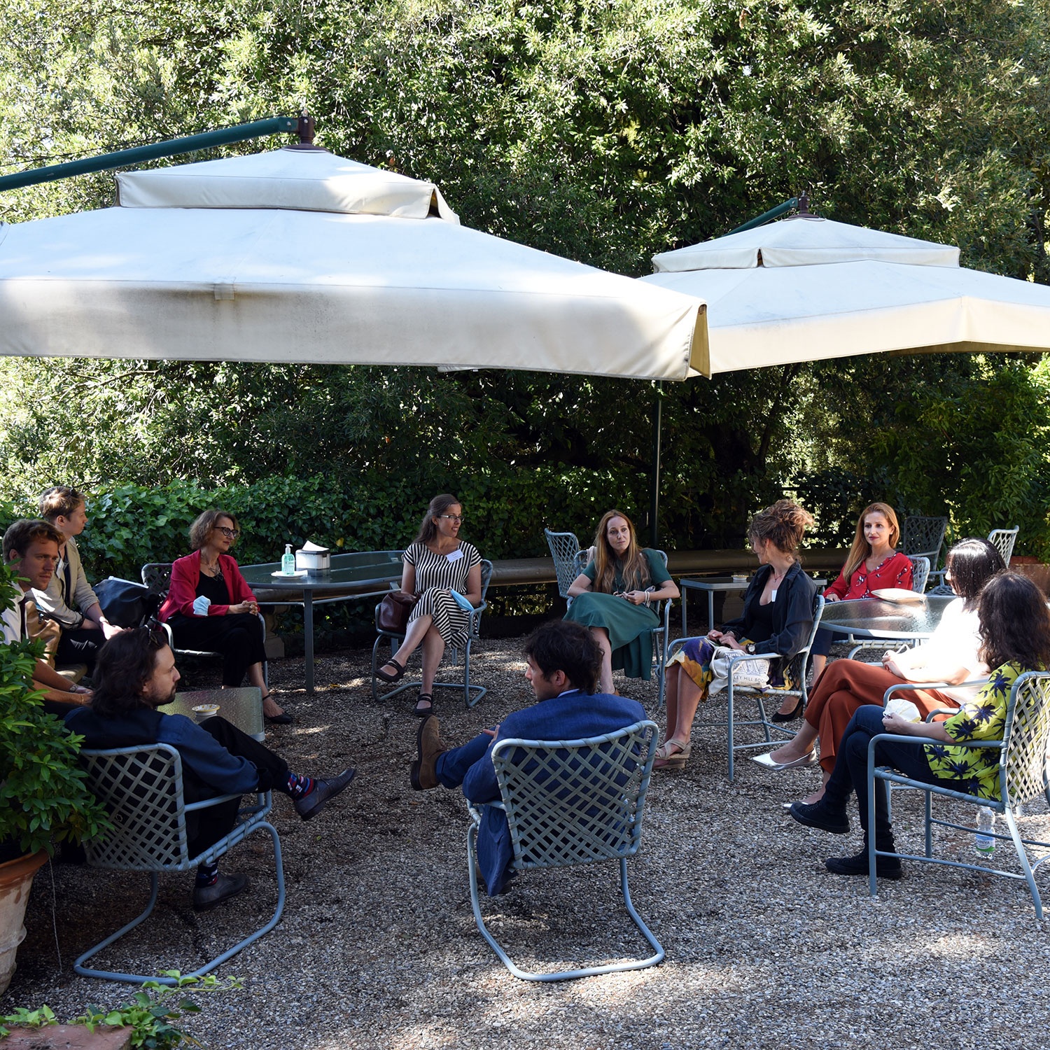 Group of fellows sitting on the Azalee terrace