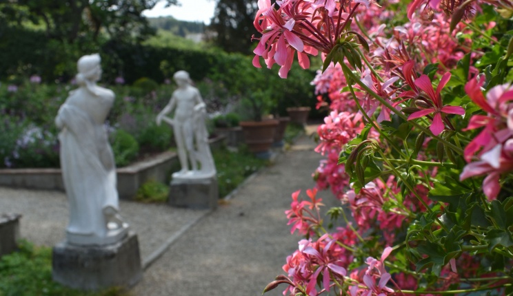 Statues and flowers in the I Tatti garden